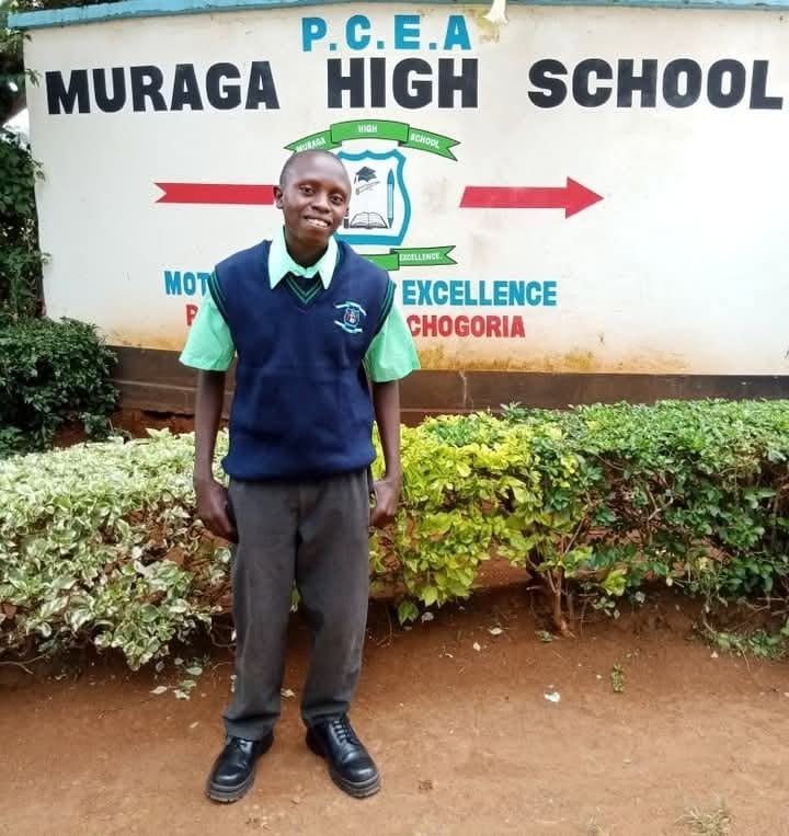 A sponsored student at his high school in Chogoria