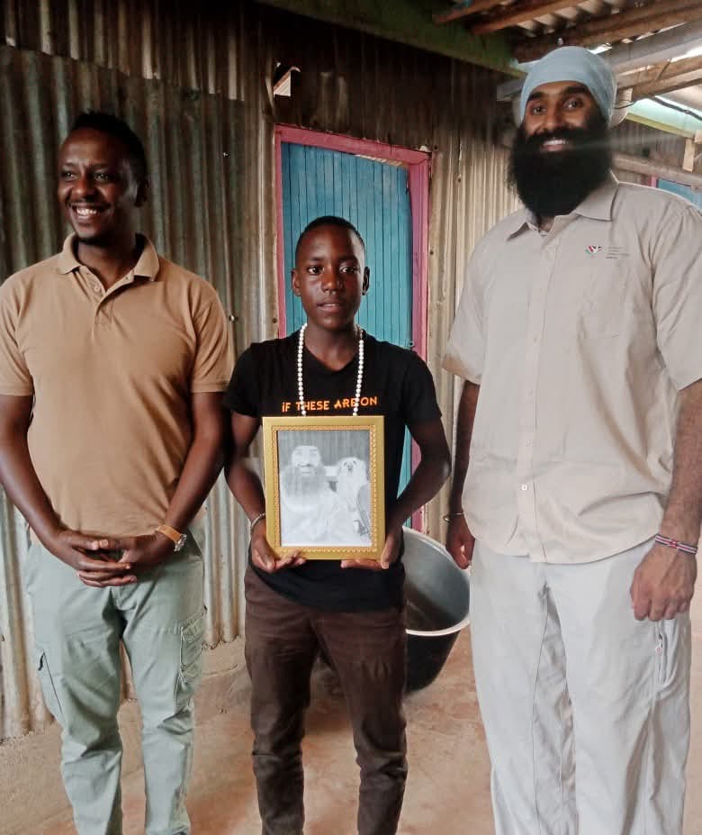 Friends of the centre with a treasured portrait