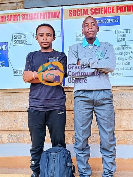 Two students beside subject and career pathway charts